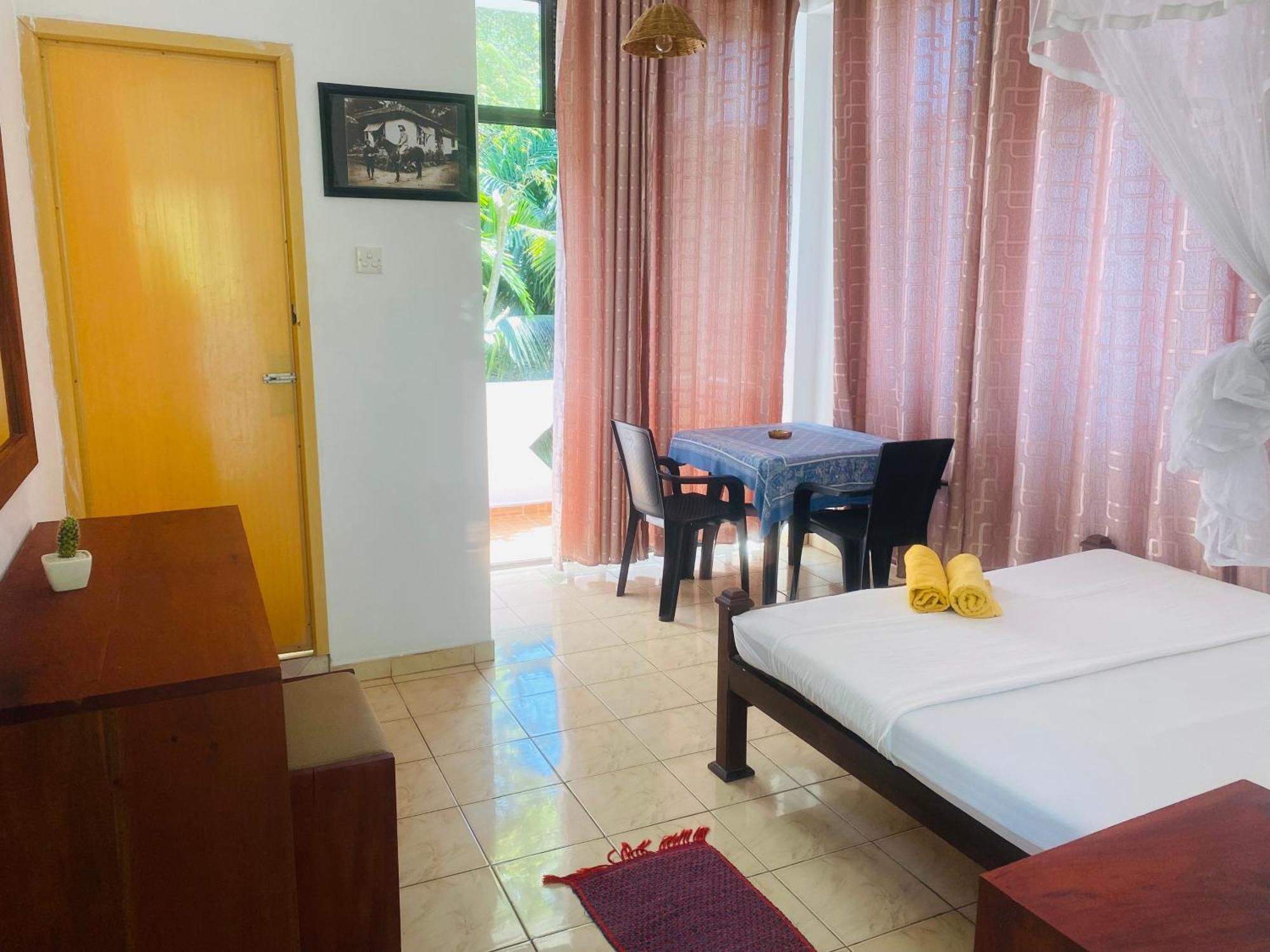 ホテル Bienvenido Cozy Madiha マータラ 部屋 写真